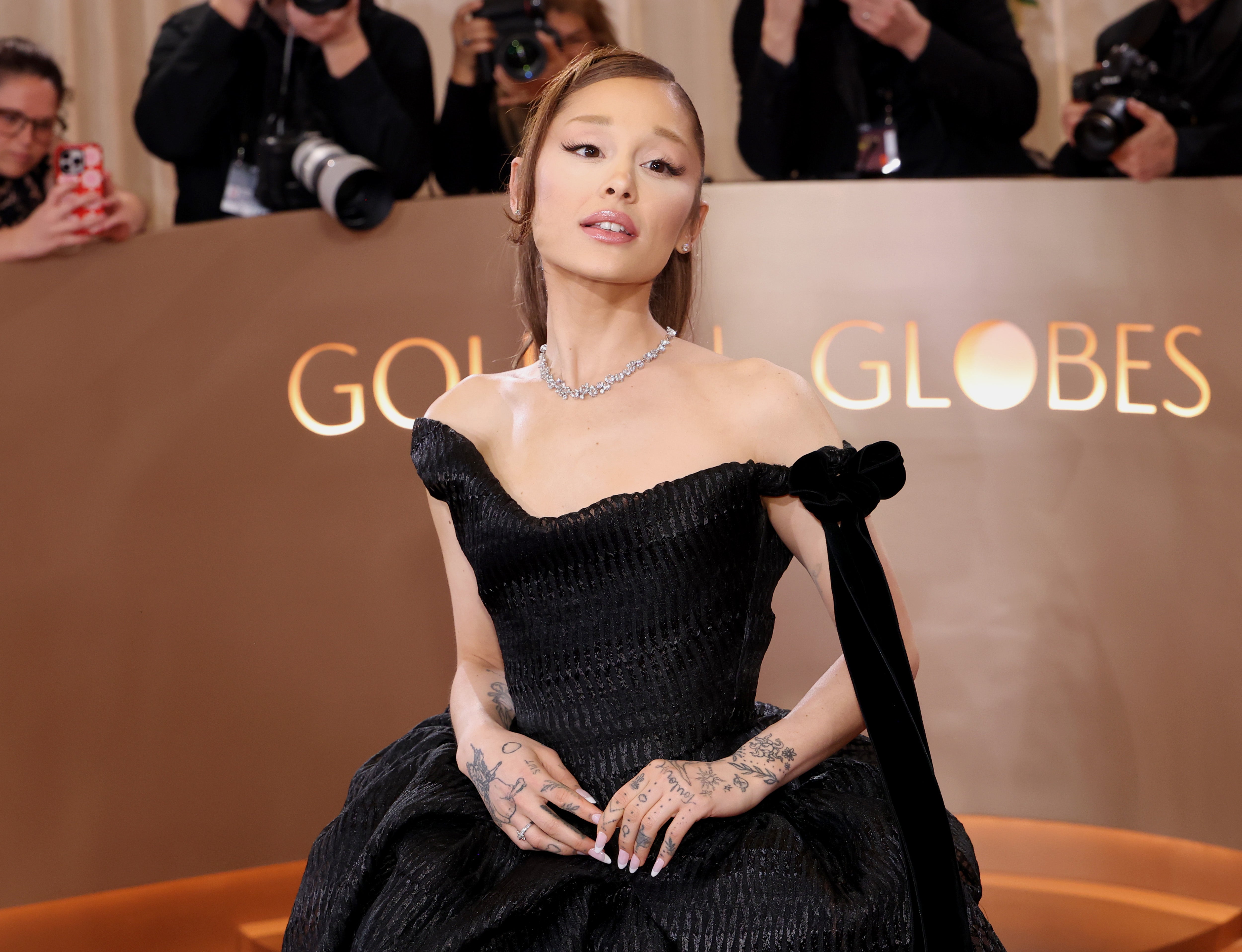 Ariana Grande says she wore hoodies all the time in 2018 because she was ‘processing a lot’