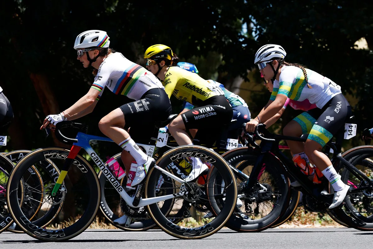 WILLUNGA, AUSTRALIA - JANUARY 17: (L-R) Magdeleine Vallieres of Canada and Team EF Education-Oatly, Margaux Vigie of France and Team Visma | Lease a Bike and Amelie Sanders of Australia and Team Australia compete during the 10th Santos Women's Tour Down Under 2026, Stage 1 a 137.4km stage from Willunga to Willunga 134m / #UCIWWT / on January 17, 2026 in Willunga, Australia. (Photo by Con Chronis/Getty Images)
