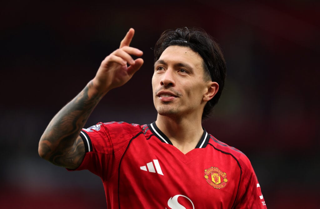 Lisandro Martinez pointing upwards for Manchester United.