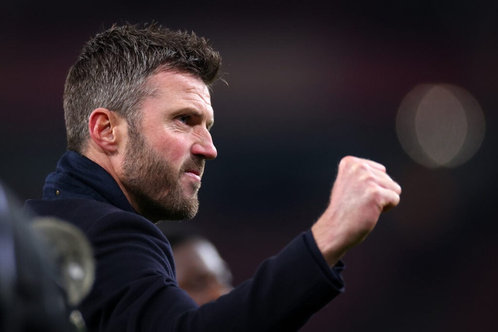 Manchester United head coach Michael Carrick celebrates after the Premier League match between Arsenal and Manchester United at the Emirates Stadium in 2026 in London, England.
