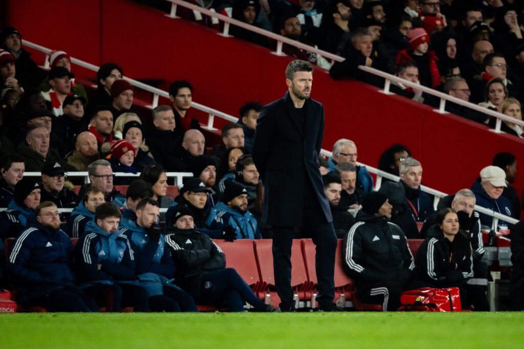 Michael Carrick looks on during the Premier League match between Arsenal and Manchester United at the Emirates Stadium in 2026 in London, England.