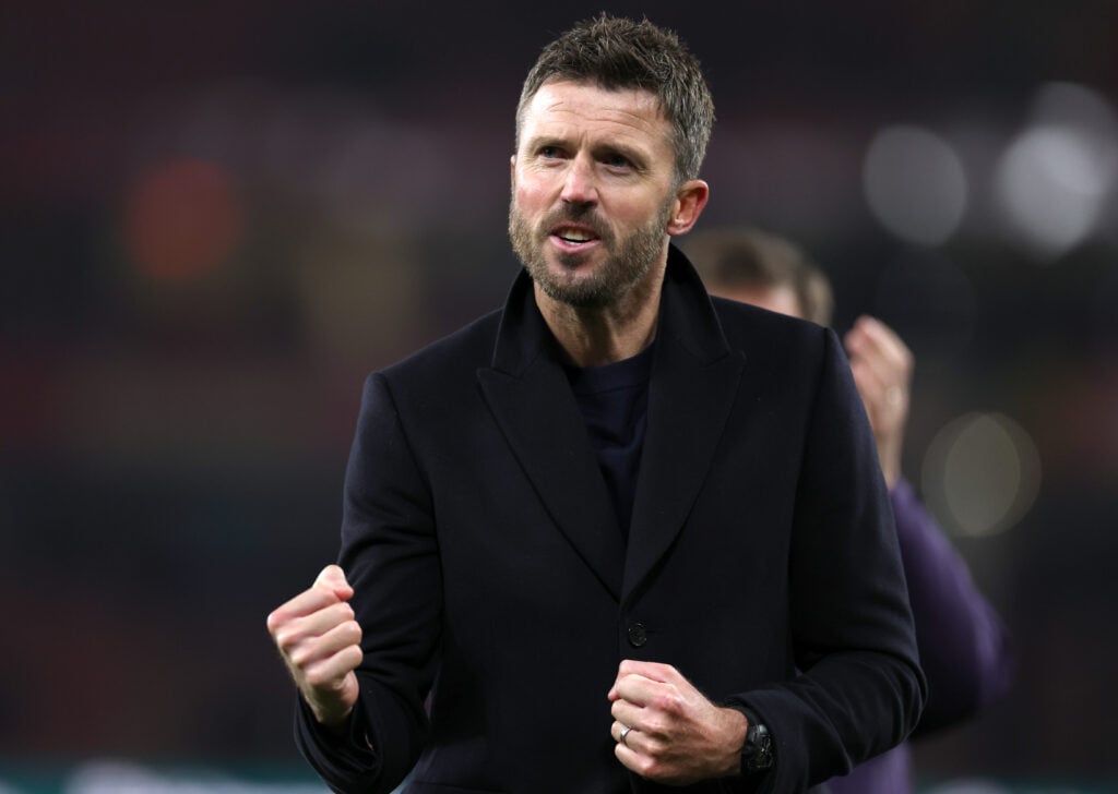 Michael Carrick celebrates as he shows appreciation to the fans following the team’s victory in the Premier League match between Arsenal and Manchester United at the Emirates Stadium in 2026 in London, England.