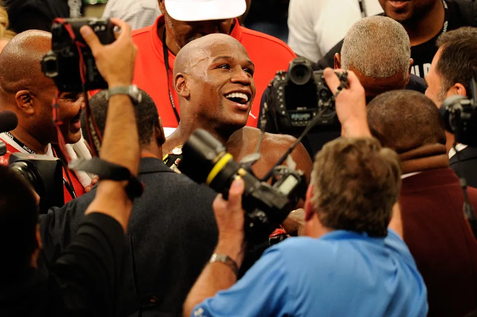 LAS VEGAS - MAY 01:  Floyd Mayweather Jr. reacts after defeating Shane Mosley by unanimous decision after the welterweight fight at the MGM Grand Garden Arena on May 1, 2010 in Las Vegas, Nevada.  (Photo by Ethan Miller/Getty Images)