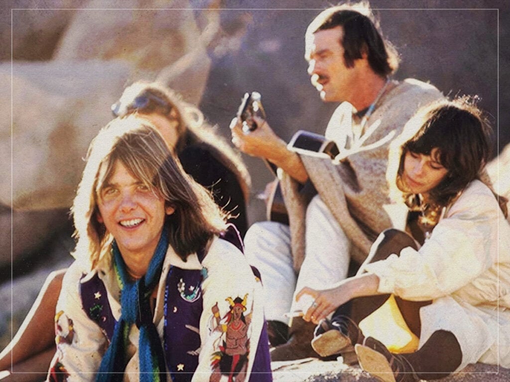 Gram Parsons, Michelle Phillips, actor Ted Markland, and photographer Andee Nathanson at the 1969 Giant Rock Space Convention