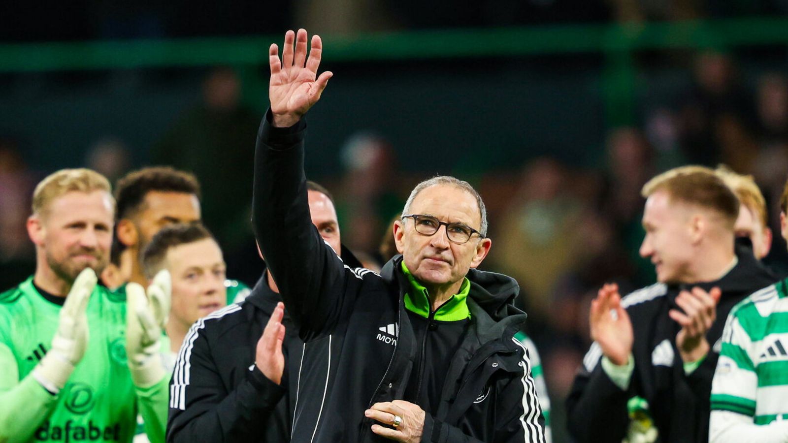 Martin O'Neill salutes the travelling Celtic support.
