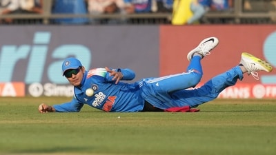 India's captain Shubman Gill dives to field the ball. (AP)