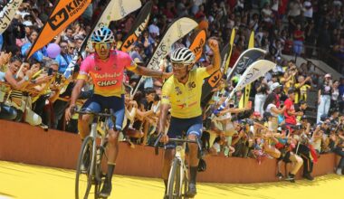 Venezuela's Eduin Becerra (R), from team Trululu Grupo La Guacamaya, celebrates after winning the 60th 'Vuelta al Tachira' road bicycle race between San Rafael del Pi&ntilde;al and Cerro del Cristo Rey in San Cristobal, Tachira State, Venezuela on January 19, 2025. (Photo by Johnny PARRA / AFP)