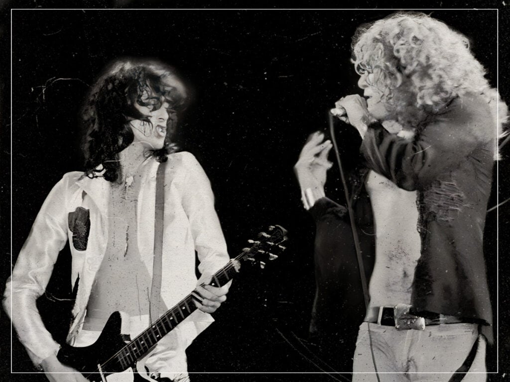 Jimmy Page and Robert Plant of Led Zeppelin onstage bare-chested at Madison Square Garden in New York City in 1977.