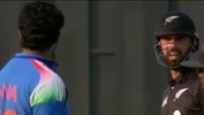 Harshit Rana and Daryl Mitchell during the first ODI. (x images)