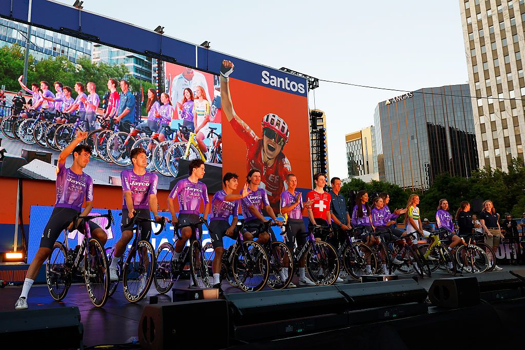ADELAIDE, AUSTRALIA - JANUARY 16: A general view of Ben O'Connor of Australia, Luke Durbridge of Australia, Rudy Porter of Australia, Hamish McKenzie of Australia, Kelland O'Brien of Australia, Luke Plapp of Australia, Mauro Schmid of Switzerland and Ruby Roseman-Gannon of Australia, Ella Wyllie of New Zealand, Georgia Baker of Australia, Mackenzie Coupland of Australia, Amber Pate of Australia, Josie Talbot of Australia and Team Liv AlUla Jayco during the 26th Santos Tour Down Under 2026, Team Presentation on January 16, 2026 in Adelaide, Australia. (Photo by Con Chronis/Getty Images)