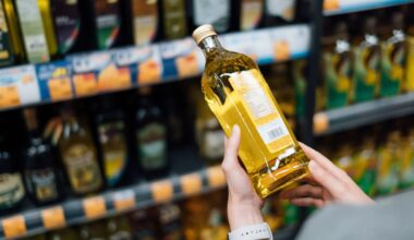 A bottle of vegetable oil in a supermarket.