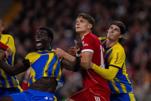 LIVERPOOL, ENGLAND - Tuesday, September 23, 2025: Liverpool's Giovanni Leoni pulls on Southampton Joshua Quarshie's shirt whilst challenged by Southampton’s Ronnie Edwards during the Football League Cup 3rd Round match between Liverpool FC and Southampton FC at Anfield. (Photo by David Rawcliffe/Propaganda)