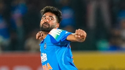 India's Mohammed Siraj celebrates after New Zealand's Daryl Mitchell. (PTI)