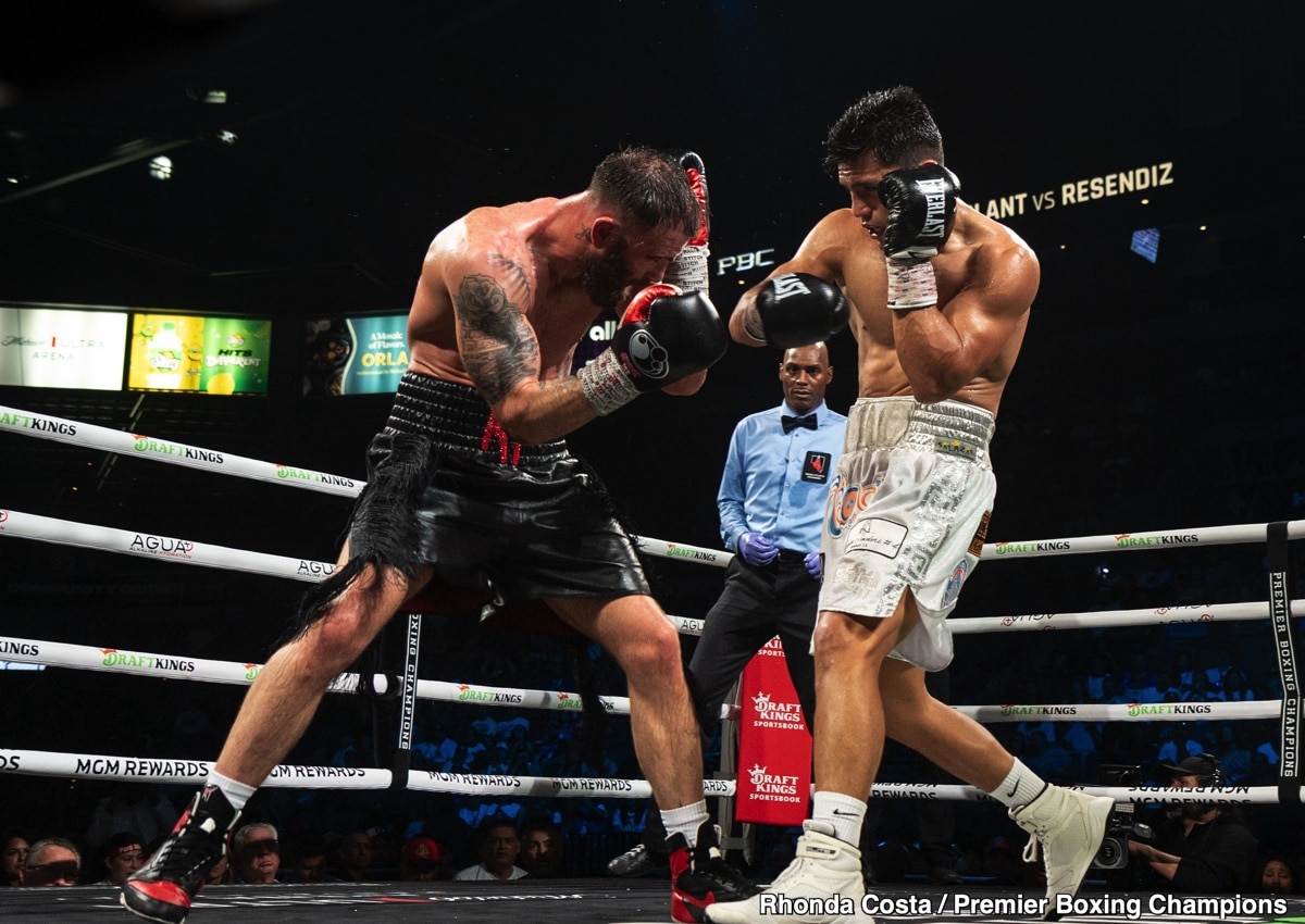 Jose Armando Resendiz blocks a punch from Caleb Plant during their super middleweight bout on May 31, 2025, at the Michelob Ultra Arena in Las Vegas, Nevada.