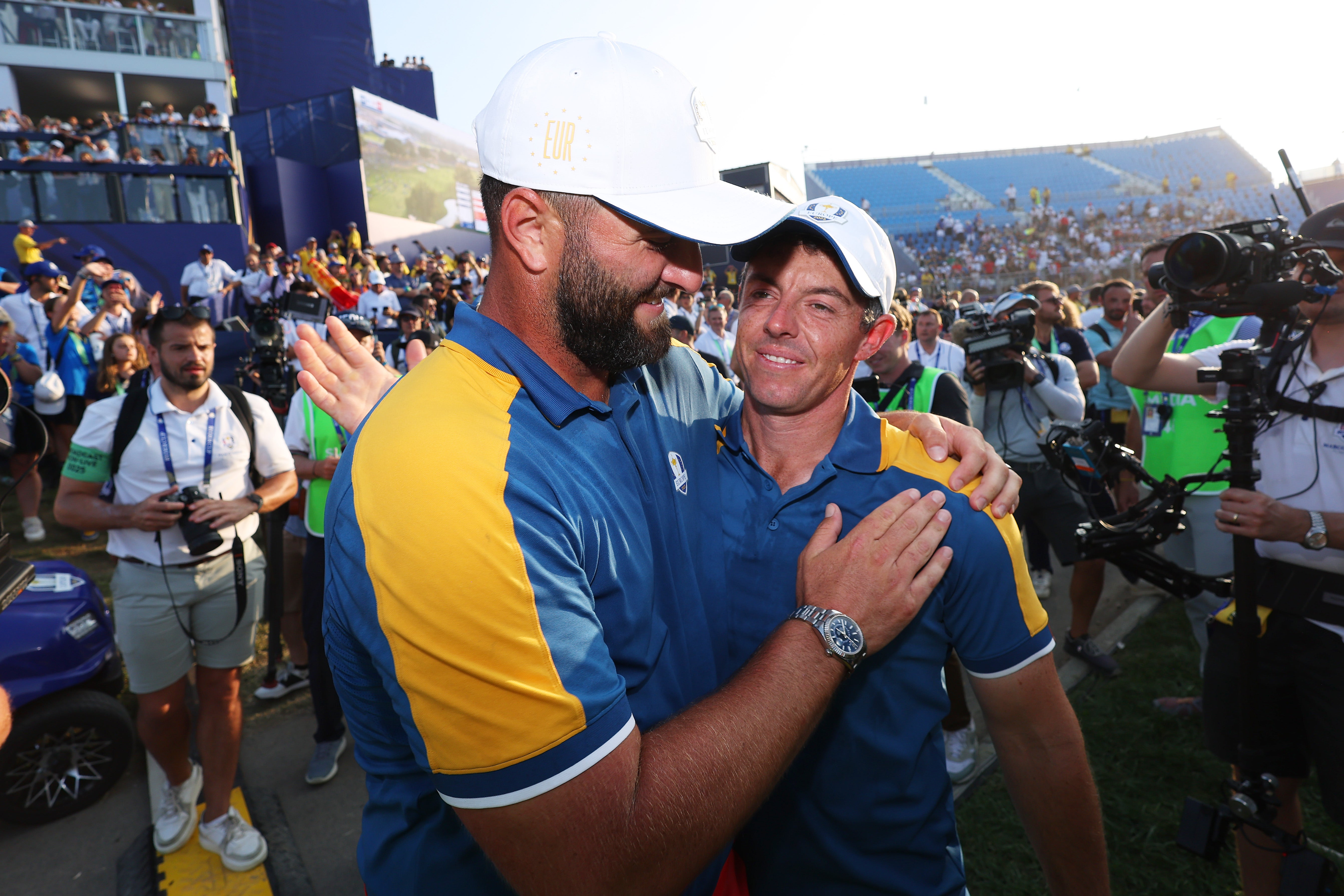 Rory McIlroy and Jon Rahm of Team Europe celebrate in 2023 after victory at Marco Simone