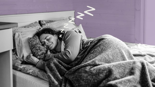 Woman sleeping in bed underneath a blanket against a purple background.
