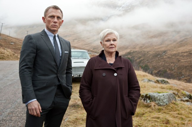 Editorial use only. No book cover usage. Mandatory Credit: Photo by Col Pics/Everett/Shutterstock (1966623l) SKYFALL, from left: Daniel Craig as James Bond, Judi Dench Skyfall - 2012
