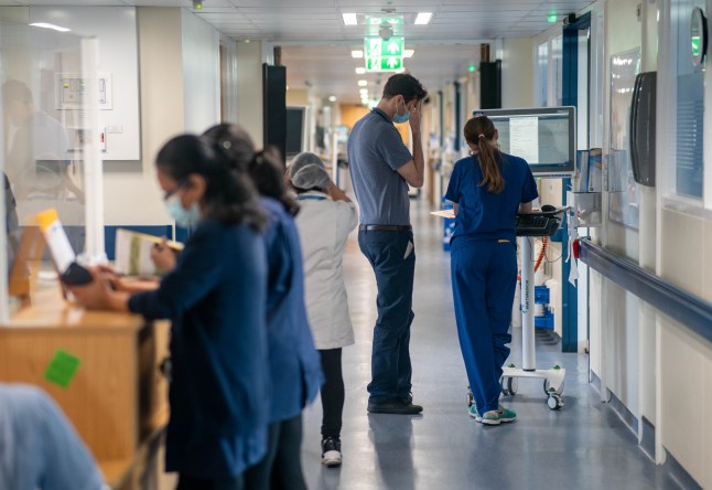 EMBARGOED TO 0001 FRIDAY OCTOBER 31 File photo dated 18/01/23 of a general view of staff on a NHS hospital ward at Ealing Hospital in London. The Government's aim to move more NHS care into the community will not be achieved unless action is taken over the "dire state of district nursing", experts have warned. Issue date: Friday October 31, 2025. PA Photo. A new report from the Nuffield Trust think tank said one in four district nurses left the workforce in the year to September last year, despite rising demand for care in people's homes, community settings and care homes. Photo credit should read: Jeff Moore/PA Wire