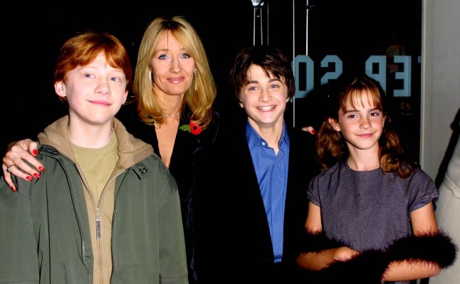 LONDON - NOVEMBER 4: Actors Rupert Grint, Author JK Rowling, Daniel Radcliffe and Emma Watson attend the world premiere of the first Harry Potter film, 'Harry Potter and the Philosopher's Stone' at the Odeon Leicester Square, London, November 4, 2001. (Photo by Gareth Davies/Getty Images)