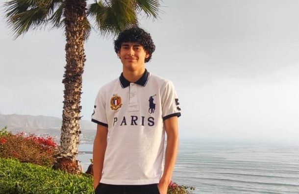 Pictured is Luis Guembes This is the first picture of a schoolboy footballer who was stabbed to death in a country park in Guildford this week. Luis Guembes, 15, seen here smiling and hugging his father on a recent family holiday, was found with knife wounds after being attacked on Monday evening. The teenager, who was originally from Peru, attended All Hallows Catholic School in Farnham and had won trophies playing for youth soccer teams. The boy, who also used the name Gabriel, died from injuries inflicted by an attacker at Peacock Wood in Stoke Park on the outskirts of the Surrey town. Images provided via Jacob Dirnhuber