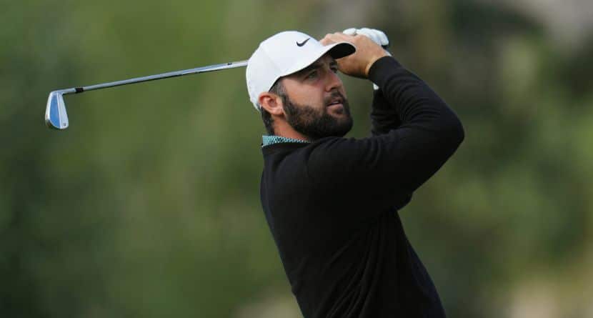 Scottie Scheffler watches his shot from the third tee during the first round of the American Express golf event at La Quinta County Club Thursday, Jan. 22, 2026, in La Quinta, Calif. (AP Photo/Ross D. Franklin)