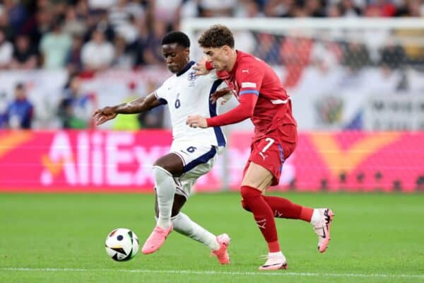 GELSENKIRCHEN, GERMANY - JUNE 16: Marc Guehi of England controls the ball whilst under pressure from Dusan Vlahovic of Serbia during the UEFA EURO 2024 group stage match between Serbia and England at Arena AufSchalke on June 16, 2024 in Gelsenkirchen, Germany. (Photo by Matt McNulty - UEFA/UEFA via Getty Images)