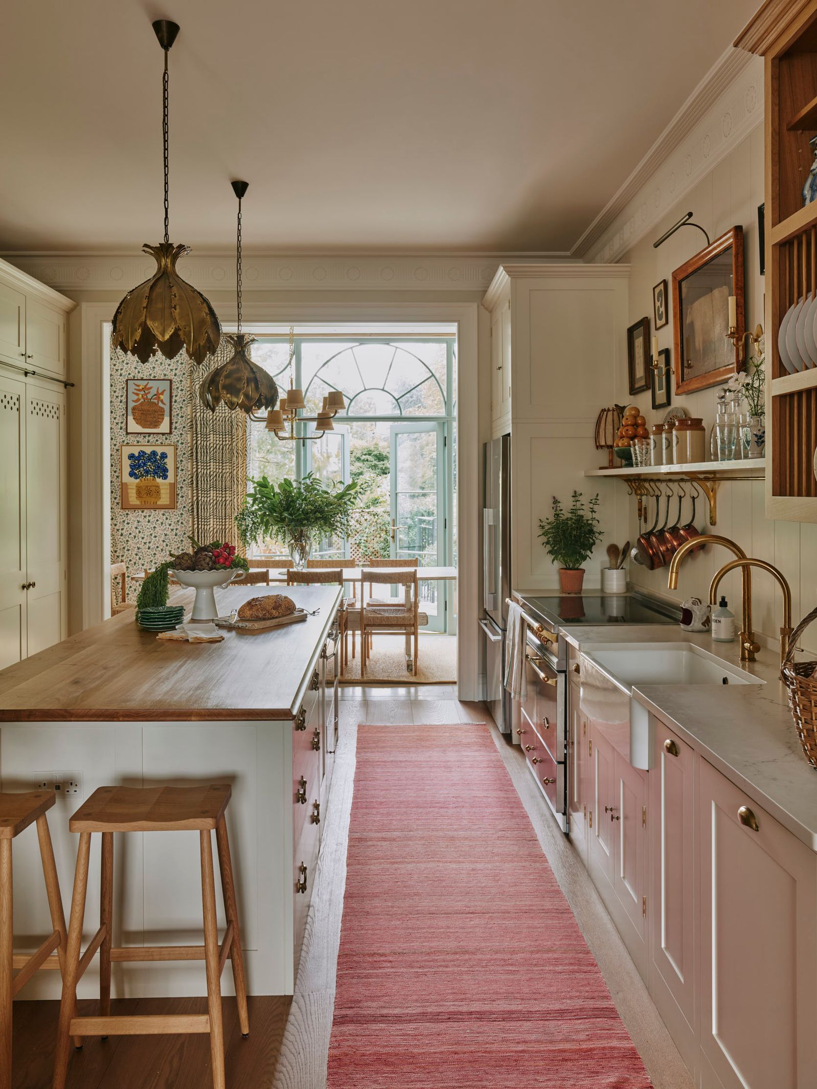 Image may contain Indoors Interior Design Home Decor Kitchen Sink Plant Architecture Building and Dining Room