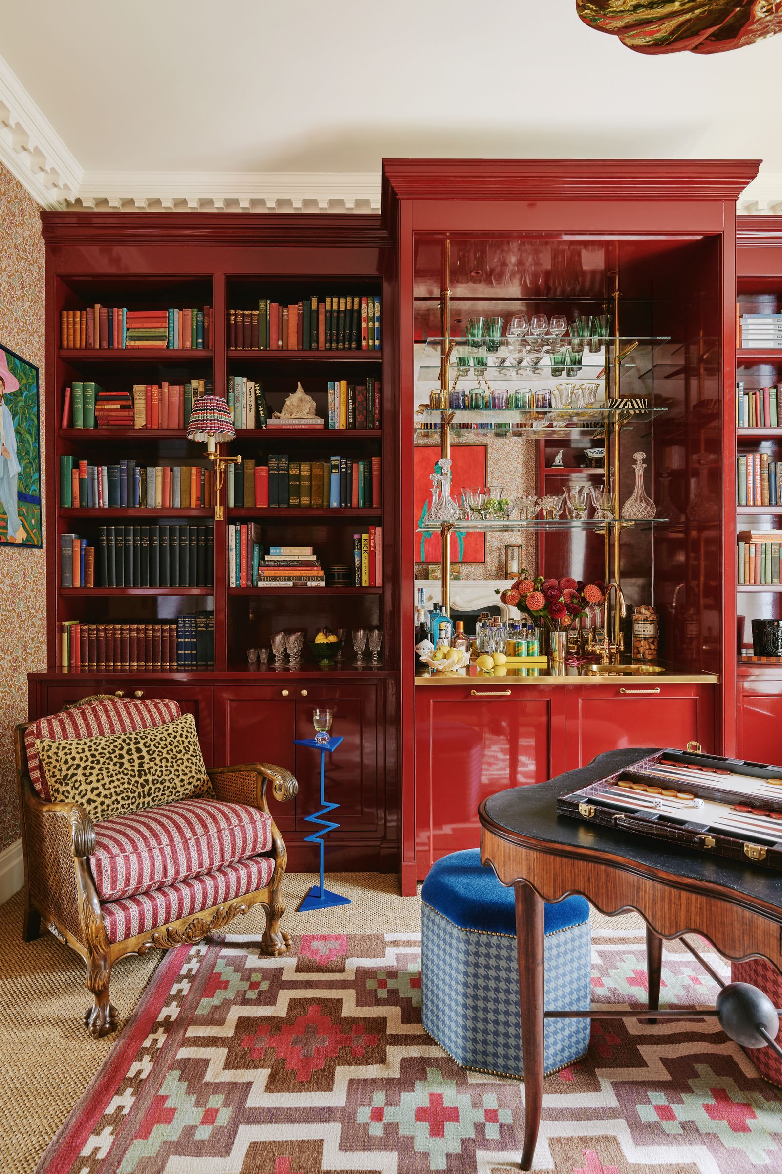 Image may contain Furniture Shelf Bookcase Chair Indoors and Interior Design