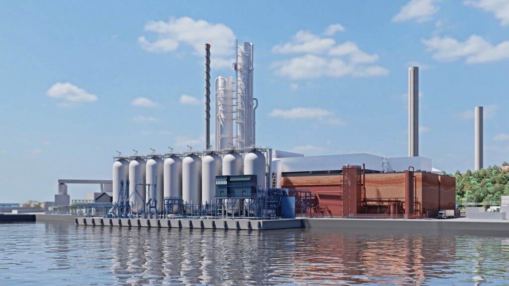 A view from the water of an industrial complex.