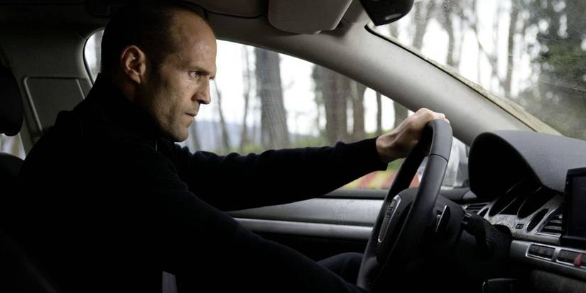 Jason Statham as Frank Martin driving in The Transporter
