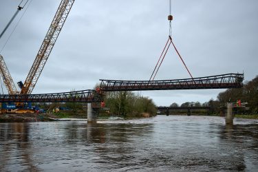 Third section of the new tram bridge being lifted Pic: Daniel McCullough