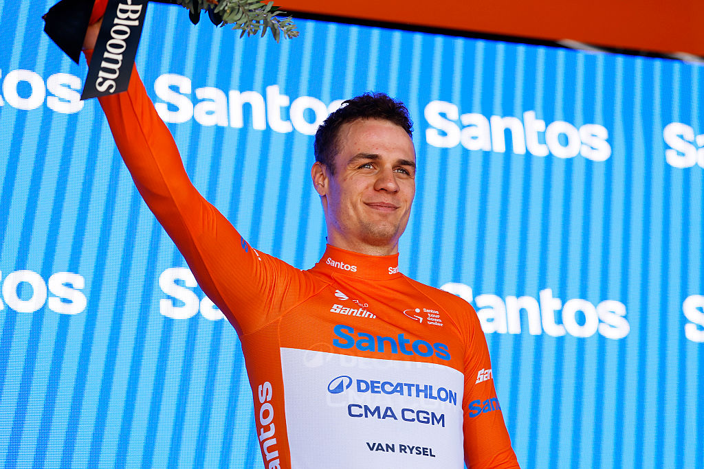 TANUNDA, AUSTRALIA - JANUARY 21: Tobias Lund Andresen of Denmark and Decathlon CMA CGM Team celebrates at podium as - Orange Santos Leader&amp;apos;s Jersey winner during the 26th Santos Tour Down Under 2026, Stage 1 a 120.6km stage from Tanunda to Tanunda on January 21, 2026 in Tanunda, Australia. (Photo by Con Chronis/Getty Images)