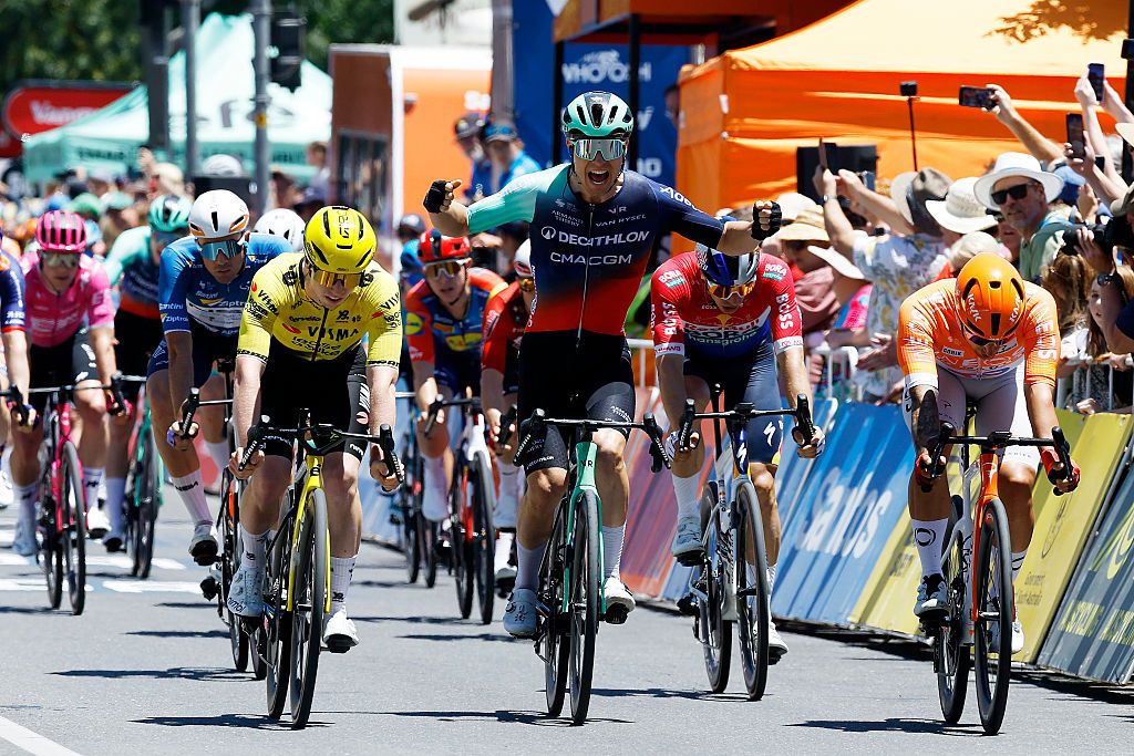TANUNDA, AUSTRALIA - JANUARY 21: Tobias Lund Andresen of Denmark and Decathlon CMA CGM Team celebrates at finish line as stage winner (C) ahead of Matthew Brennan of Great Britain and Team Visma