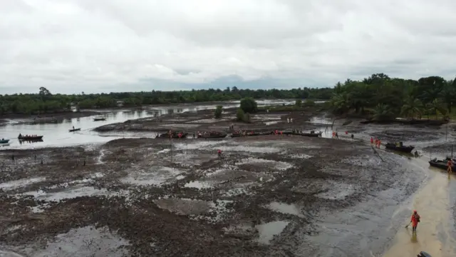 Aerial view shows officials of Hyprep cleaning up oil pollution in a community in Ogoni land