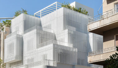 arid layers lightweight volumes atop 1950s building in athens