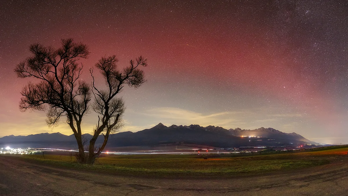 A SAR arc (Stable Auroral Red Arc) over the Tatra Mountains, Slovakia, captured by Ondrej Králik, 12 November 2025. Equipment: Canon EOS 6D DSLR camera, Sigma 24mm, f/1.4@f/2.8, ISO 4000, 13 sec