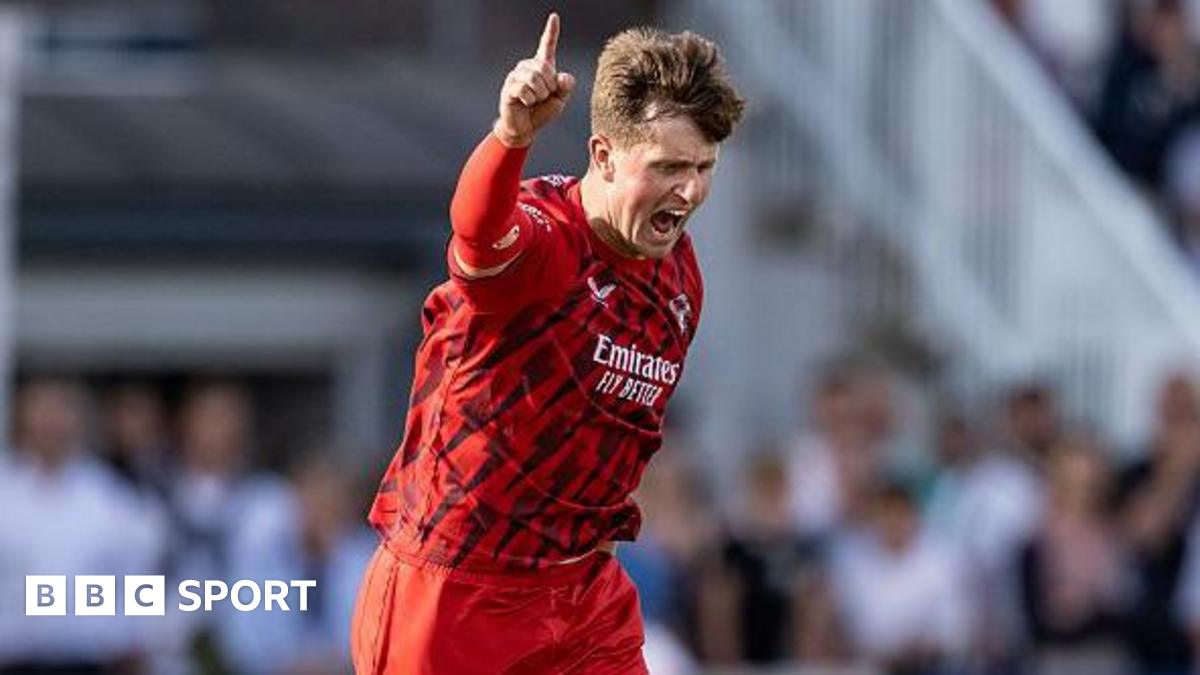 Jack Blatherwick of Lancashire Lightning celebrating taking a wicket with his finger pointing to the sky