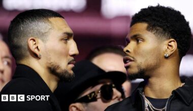 Shakur Stevenson looks at Teofimo Lopez during their face-off in New York