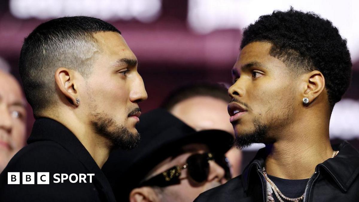 Shakur Stevenson looks at Teofimo Lopez during their face-off in New York