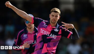Scotland's Brad Currie celebrates taking a wicket at the 2024 T20 World Cup