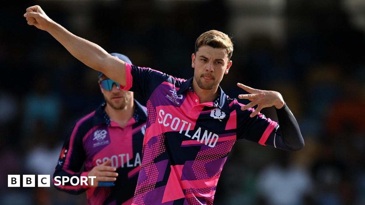 Scotland's Brad Currie celebrates taking a wicket at the 2024 T20 World Cup