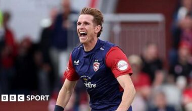 Kent bowler Fred Klaassen celebrates after taking a wicket.