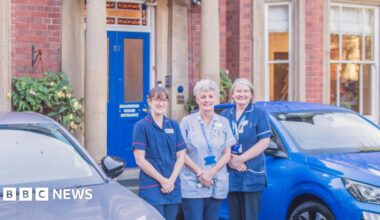 Beaumond House Hospice Care staff stood outside their headquarters, a large Victorian building in Newark