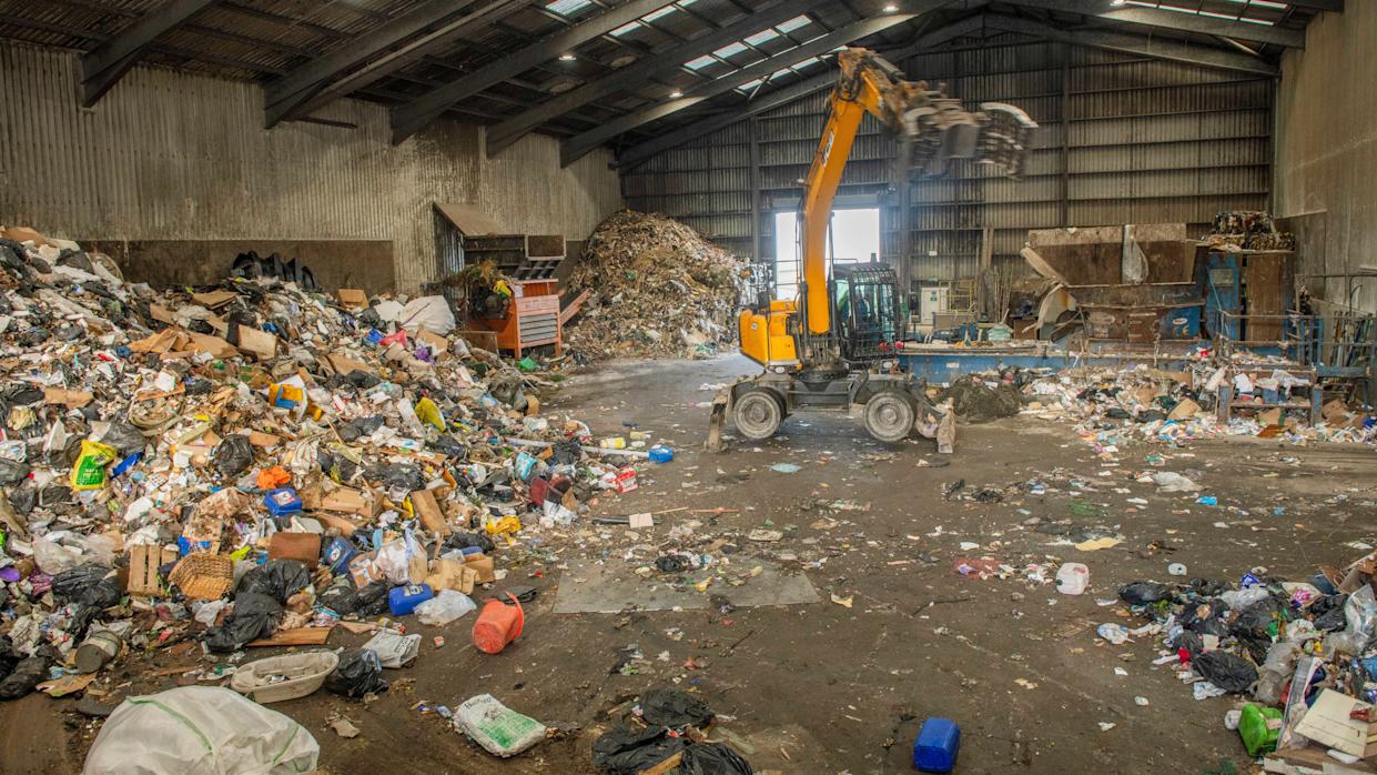 Recycling at Shetland’s Gremista Waste Management Facility with cardboard, plastics, and metal cans protecting the island’s environment.