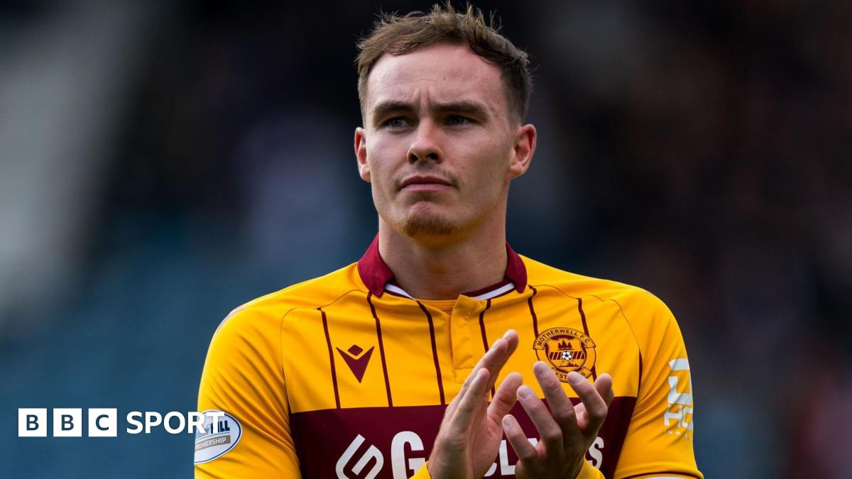 Kofi Balmer, pictured in a Motherwell kit, clapping fans