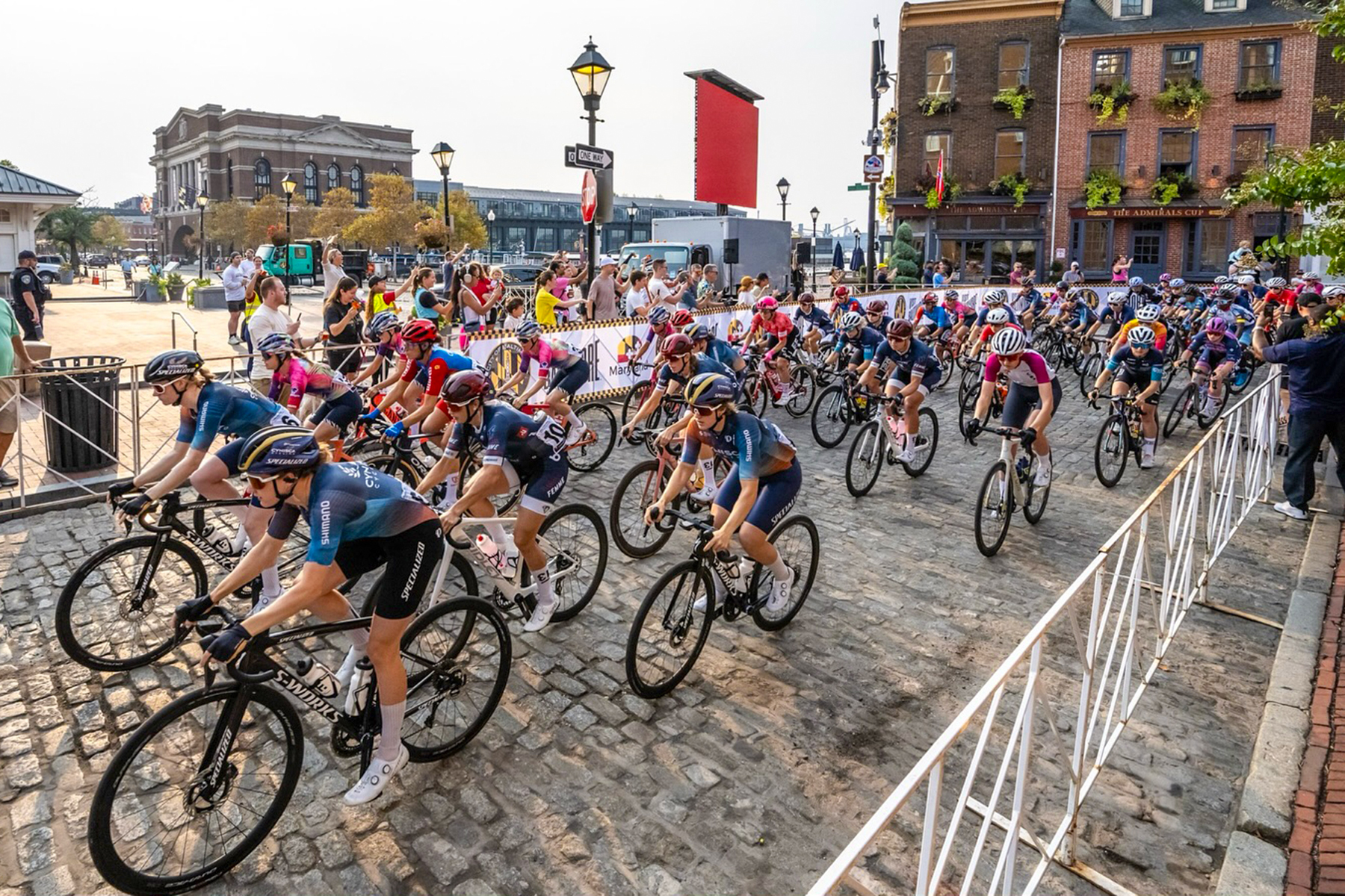 The women's peloton on the streets of Baltimore during the 2025 Maryland Cycling Classic