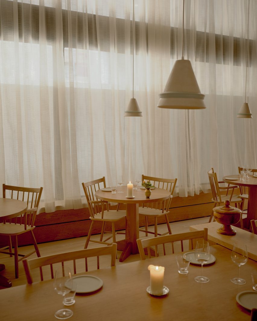 Seating areas with white curtain