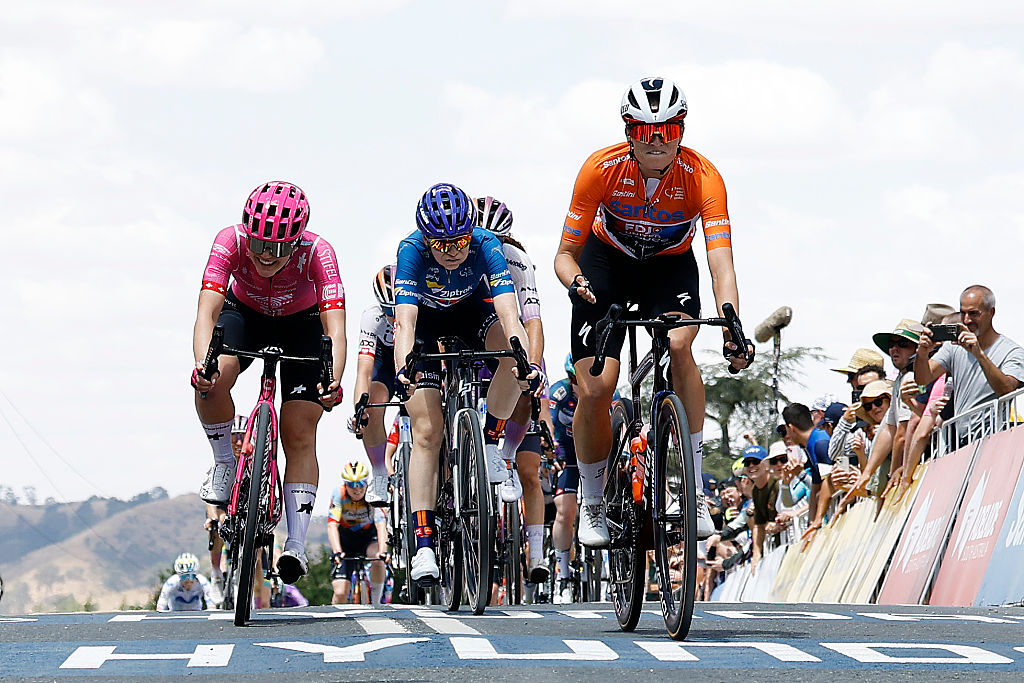 PARACOMBE, AUSTRALIA - JANUARY 18: A general view of Ally Wollaston of New Zealand and Team FDJ United - SUEZ - Orange Santos Leader&amp;apos;s Jersey celebrates at finish line as stage winner ahead of Noemi Ruegg of Switzerland and Team EF Education-Oatly, Josie Nelson of Great Britain and Team Picnic PostNL - Blue Sprint Jersey winner and Paula Blasi of Spain and UAE Team ADQ during the 10th Santos Women&amp;apos;s Tour Down Under 2026, Stage 2 a 130.7km stage from Magill to Paracombe 410m / #UCIWWT / on January 18, 2026 in Paracombe, Australia. (Photo by Con Chronis/Getty Images)