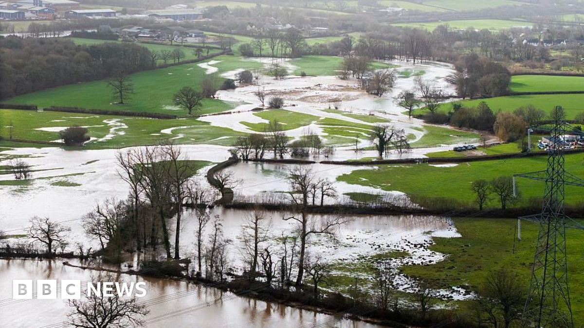 Danger to life flood warning as rain, wind and snow hit UK