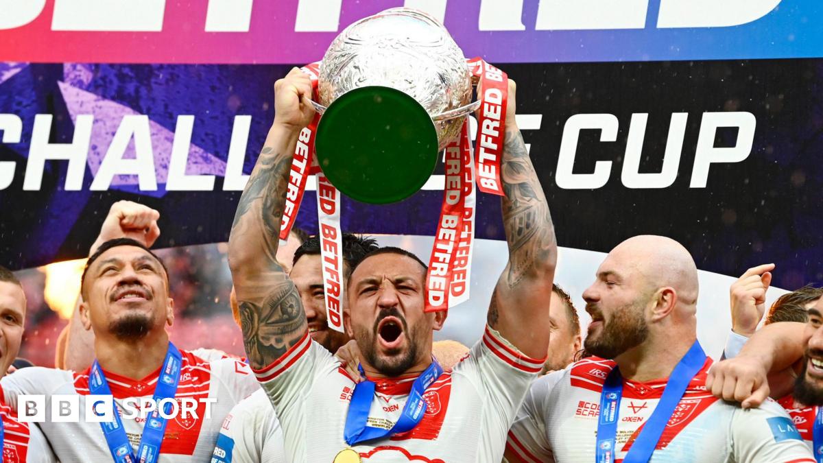 Hull KR captain Elliott Minchella lifts the Challenge Cup in 2025